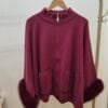 Burgandy zip-up cape jacket with faux fur cuffs