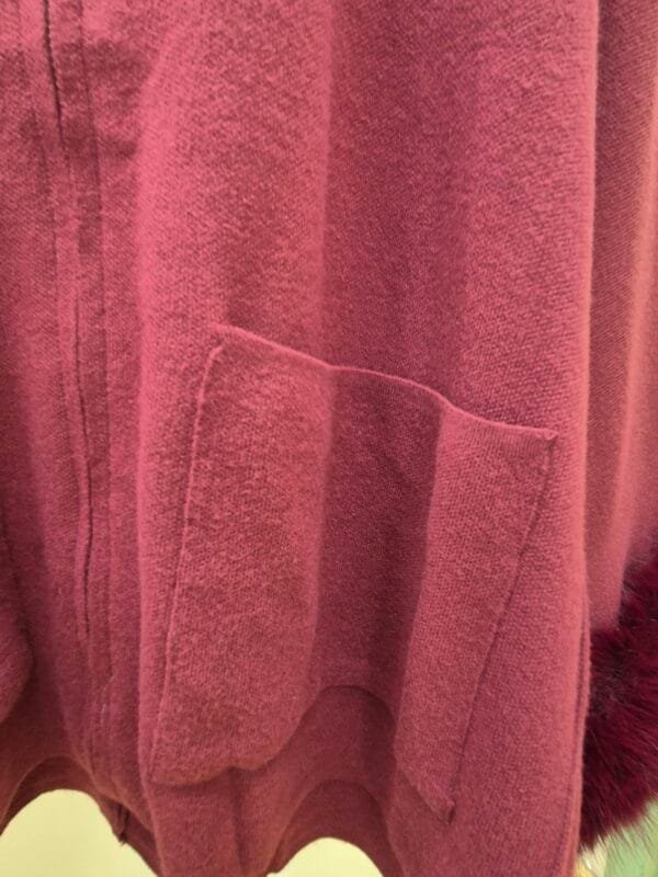 Burgandy zip-up cape jacket with faux fur cuffs