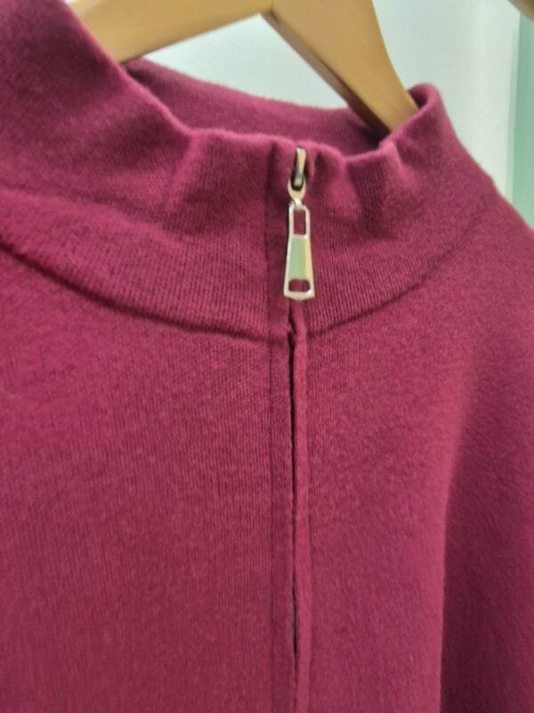 Burgandy zip-up cape jacket with faux fur cuffs