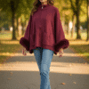 Burgandy zip-up cape jacket with faux fur cuffs