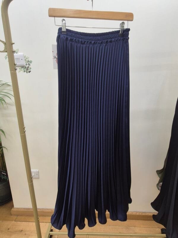 2026/01/1000388876-scaled.jpg Navy Blue Satin Pleated Midi Skirt