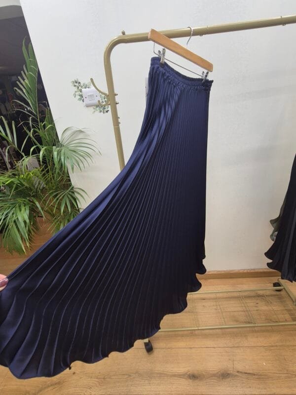 2026/01/1000388878-scaled.jpg Navy Blue Satin Pleated Midi Skirt