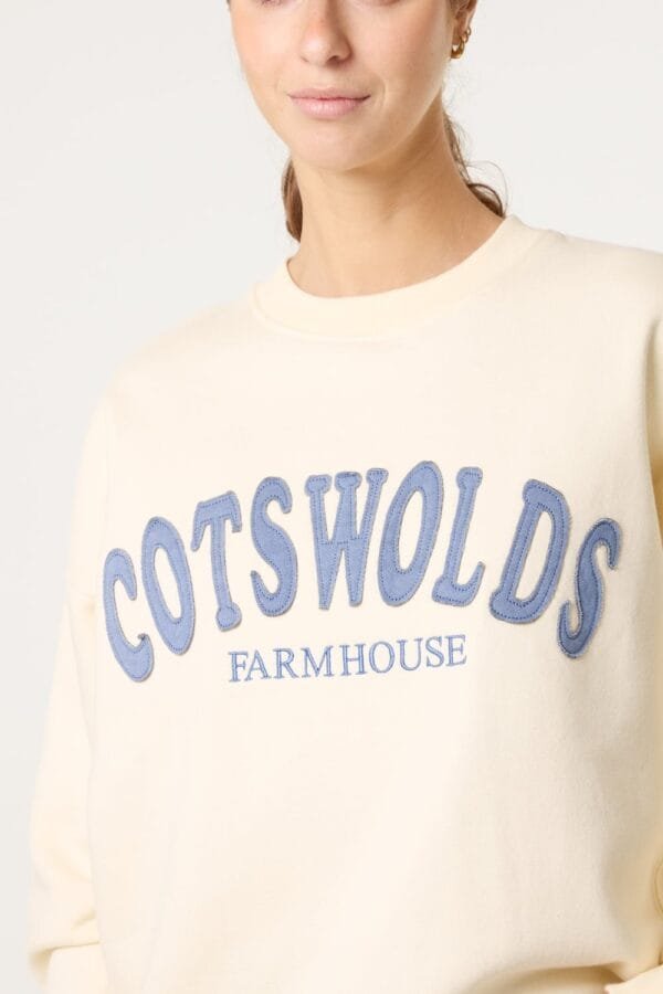 2026/02/1000396702-1.jpg Buttermilk Cotswolds Crew Neck Sweatshirt
