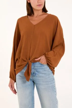 2026/03/1000392662.jpg Tan V- Neck Long Sleeve Blouse With Front Tie