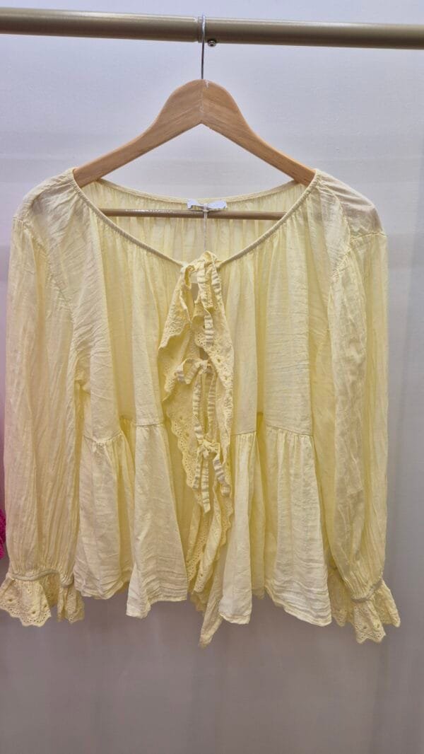 2026/03/1000409605-scaled.jpg Frill Tie Front Cotton Blouse