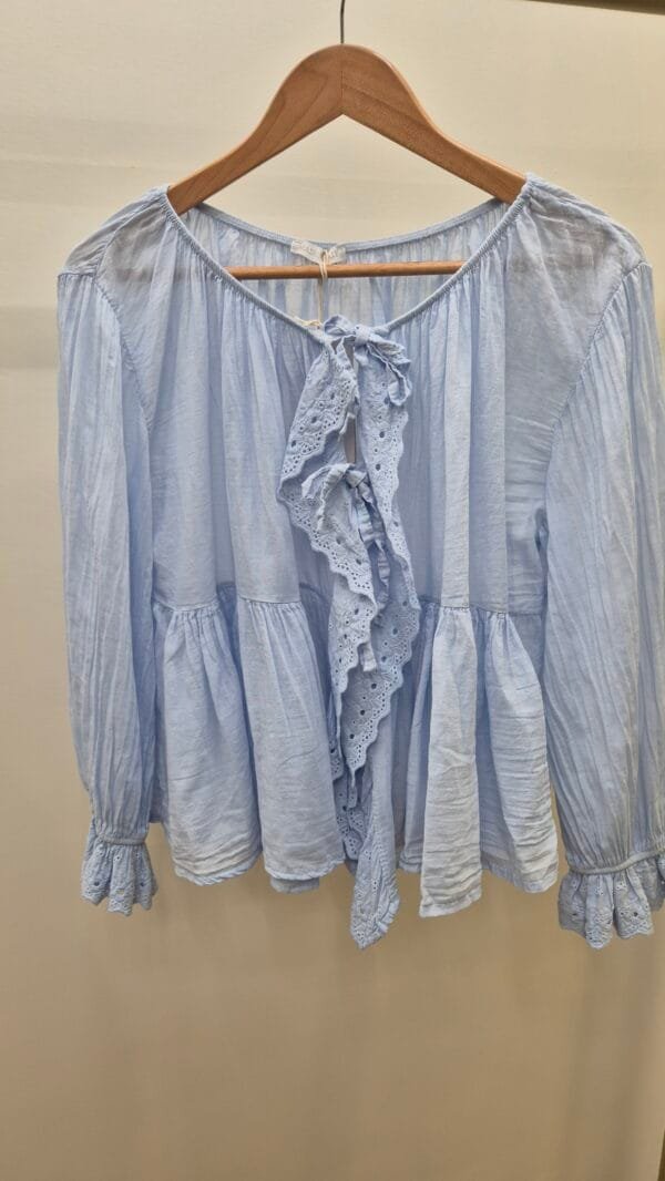 2026/03/1000409618-scaled.jpg Frill Tie Front Cotton Blouse