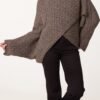 2026/09/1000492451.jpg Wrap Over Asymmetric Hem Knit Top