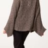 2026/09/1000492452.jpg Wrap Over Asymmetric Hem Knit Top