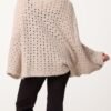 2026/09/1000492454.jpg Wrap Over Asymmetric Hem Knit Top