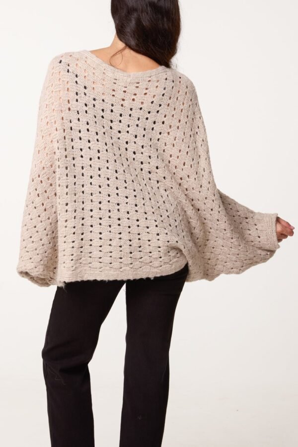 2026/09/1000492454.jpg Wrap Over Asymmetric Hem Knit Top