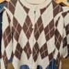 2026/09/JPEG_20260925_115622_545684531812512020-scaled.jpg Argyle Button Through Knit Cardigan
